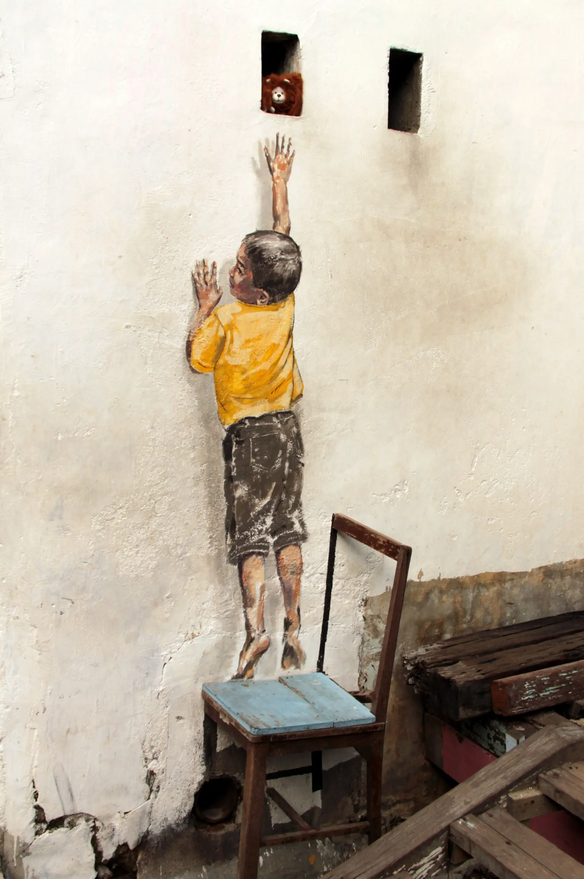 Boy on Chair - Street Art in George Town