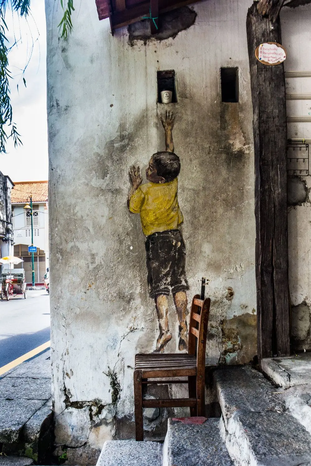 Boy on Chair - Street Art in George Town