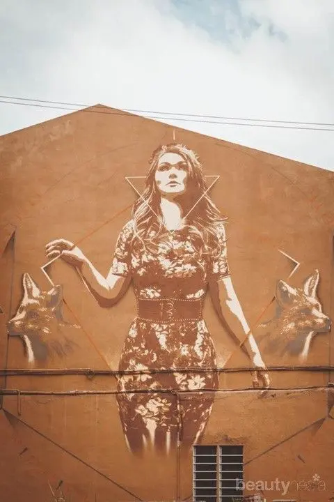 Woman and Two Wolves Street Art