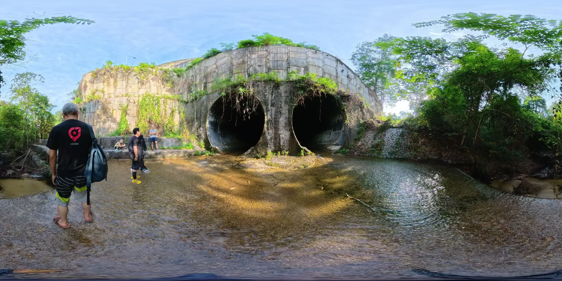 Tunnel leading to waterfall